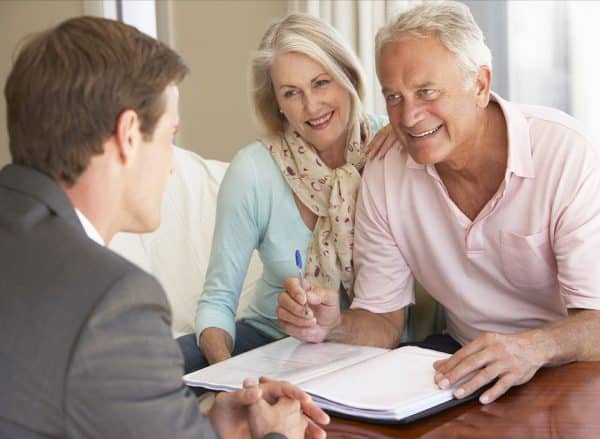 Older Couple With Financial Advisor | Elder Care Attorney | Myatt & Bell, P.C.