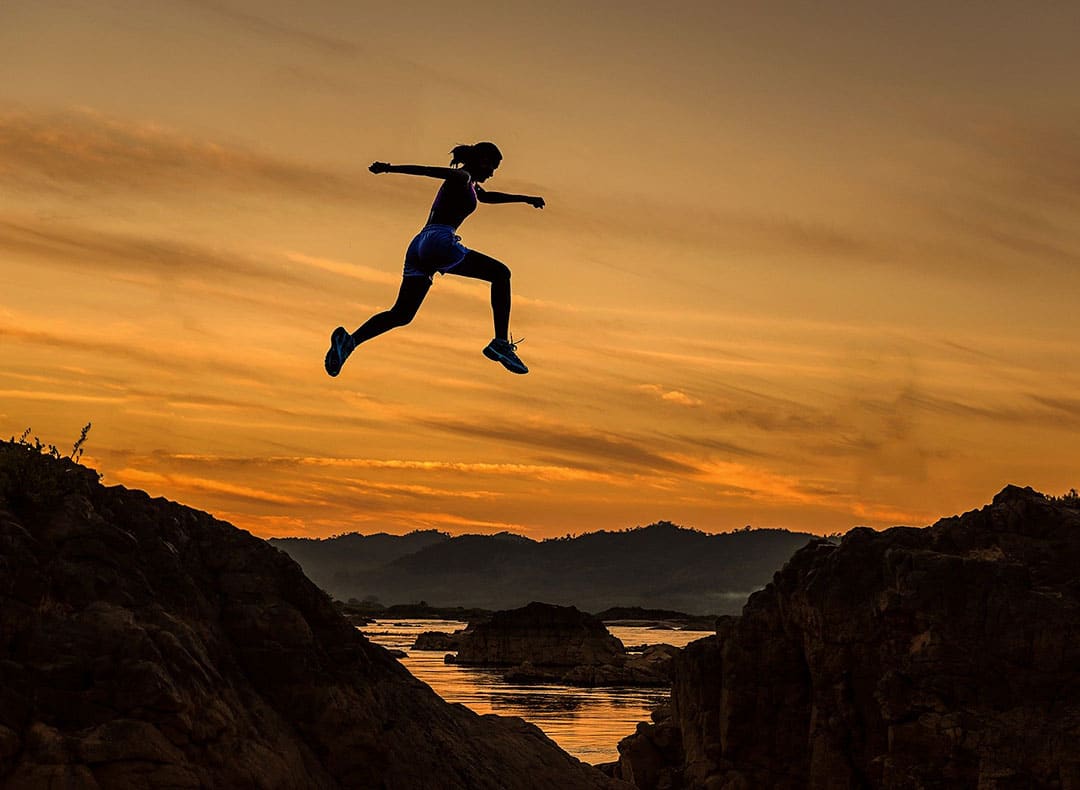 Silhouette Of Woman Jumping | Business Law Attorney | Myatt & Bell