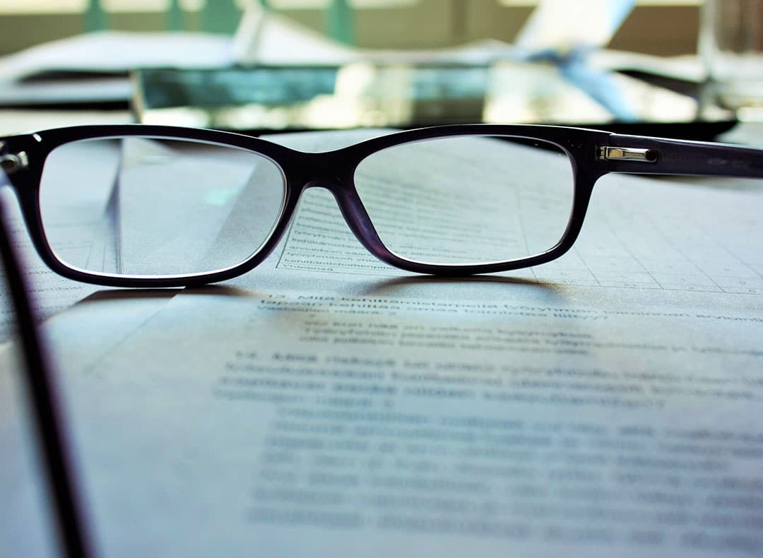 Reading Glasses Positioned On A Pile Of Paperwork | Estate Lawyer | Myatt & Bell